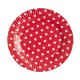 Rouges assiettes en papier rondes avec des pois blancs