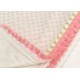 Manta infantil crema remate borlas color rosa 75x100 cm
